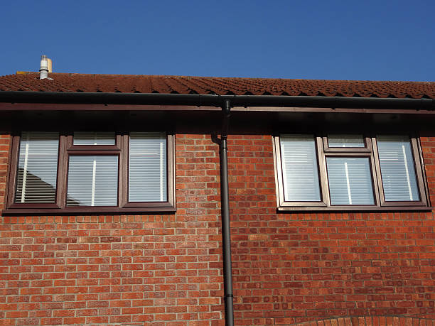istock Image of extended house with red bricks, different colour mortar 471760668