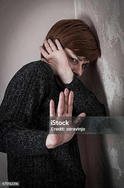 Scared And Abused Woman Stock Photo - Download Image Now - 2015, Abuse, Adult