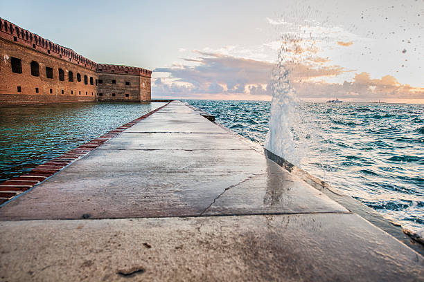 This is a horizontal, color toned photograph of the brick fortress, Fort Jefferson on Garden Key in the Dry Tortugas National Park.