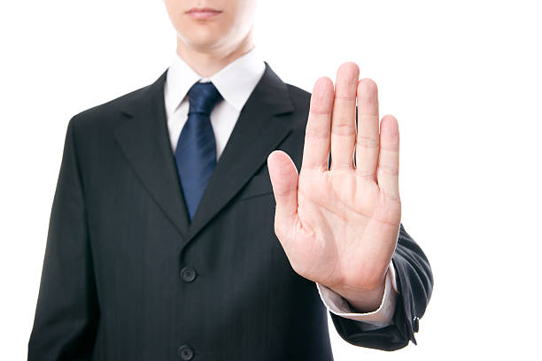 istock Businessmen shows stop sign 471763785