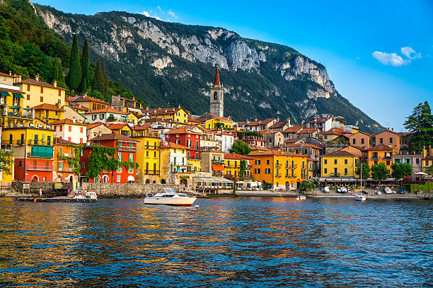 Varenna, Lake Como, Lombardy, Italy View of Varenna village on lake Como, at sunset. Lombardy, Italy. italian lake district photos stock pictures, royalty-free photos & images