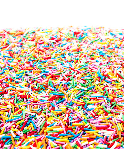 istock Colorful candy sprinkles isolated on white background 471766467