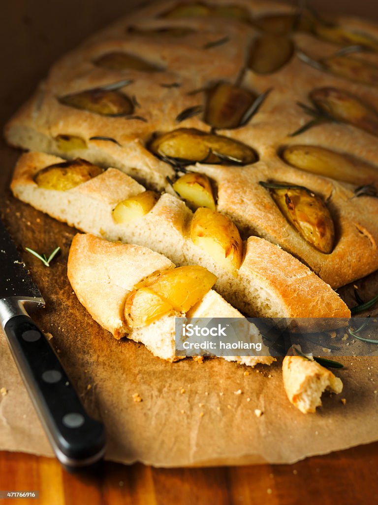 focaccia bread Home baked focaccia bread with baby potatoes and rosemary 2015 Stock Photo