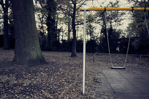 istock Half Yellow Swing in the Park 471767266
