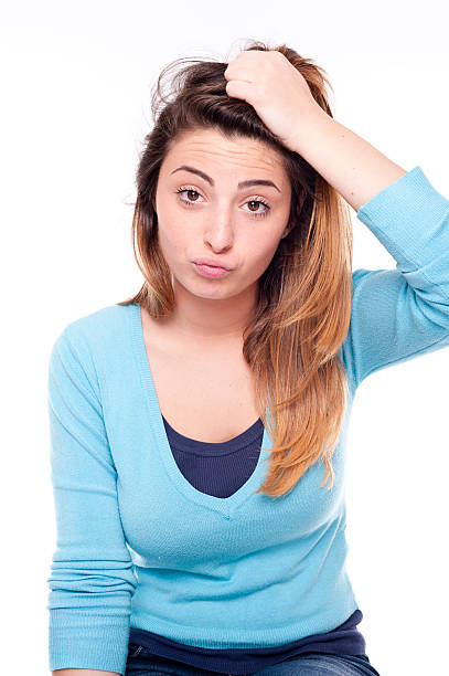 istock Young bored cute woman thinking on white background 471767291