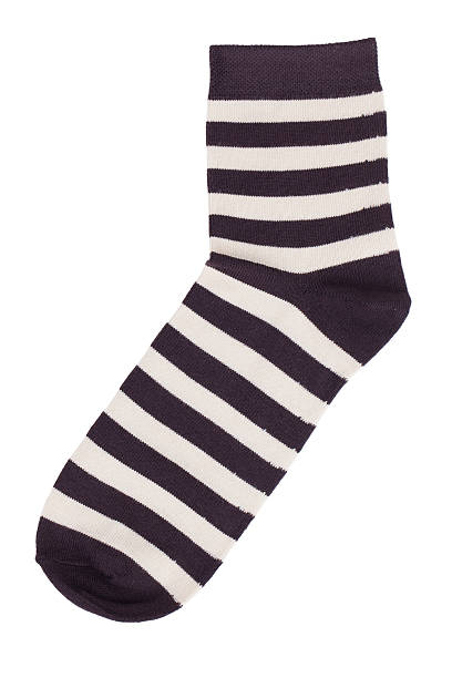 istock Black sock in a light yellow stripes 471769505