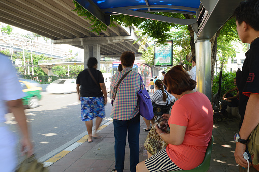 Taling Chan,Bangkok,Thailand-April 02,2015;People  waiting the bus.