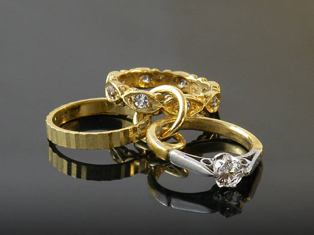 istock Gold and diamond rings 471770365