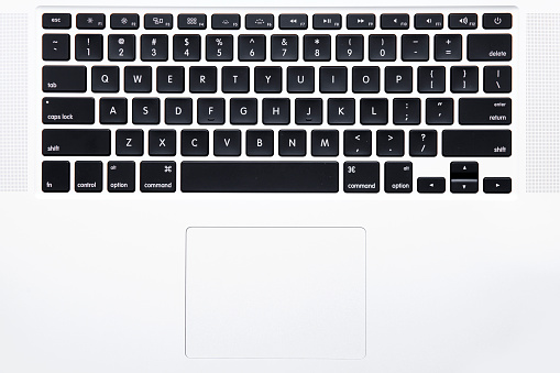 New York City, U.S.A - April 15, 2015: Top view of the keyboard of Apple MacBook Pro Notebook Computer   It is a laptop computer that produced by Apple Inc. 