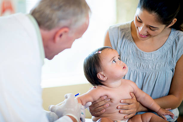 istock Baby and Mother at the Doctors 471771682