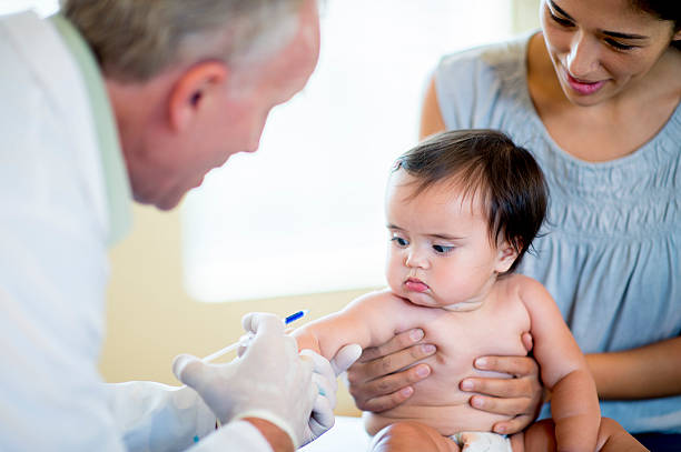 istock Baby Girl Getting a Shot 471771684