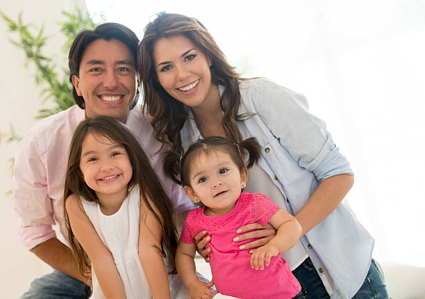 istock Beautiful Latin family at home 471771790