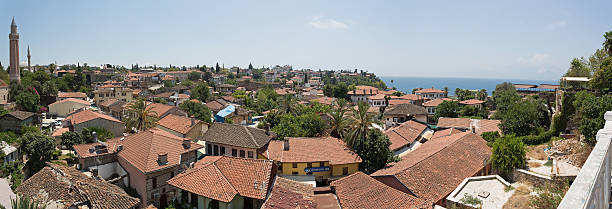 Roofs of houses on the coast of Antalya in summer stock photo