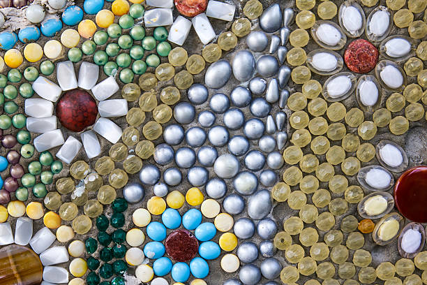 Thai Benjarong bowl on tile mosaic background.