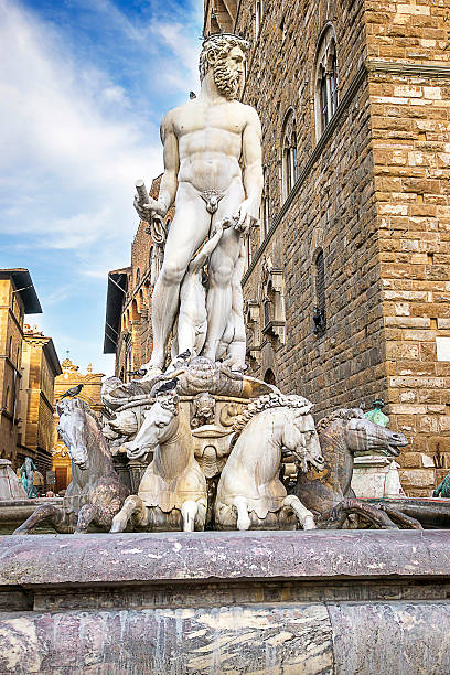 istock Neptune statue near the Old Palace (Palazzo Vecchio) on Square 471775802
