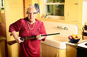 Grumpy Granny in Kitchen with Gun