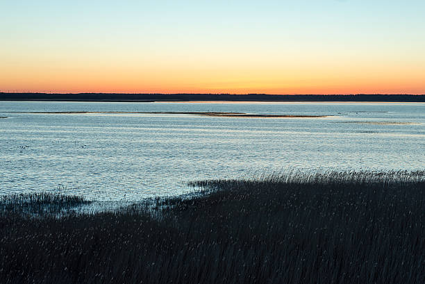istock beautiful sunrise over country lake 471777522