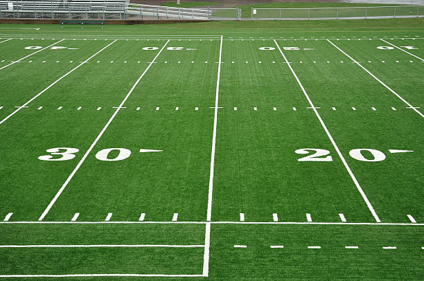 Twenty and Thirty yard line on American football field stock photo