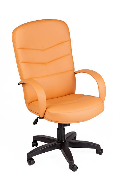 istock The office chair from yellow leather. Isolated 471777984