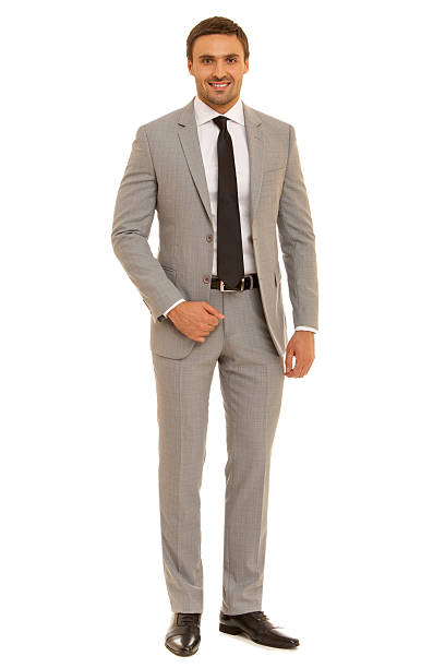istock Well-dressed man. Charismatic businessman standing on white background 471778360