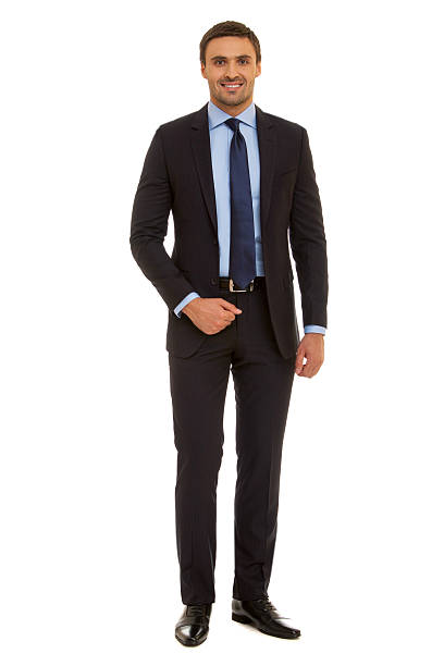 istock Well-dressed man. Charismatic businessman standing on white background 471778376