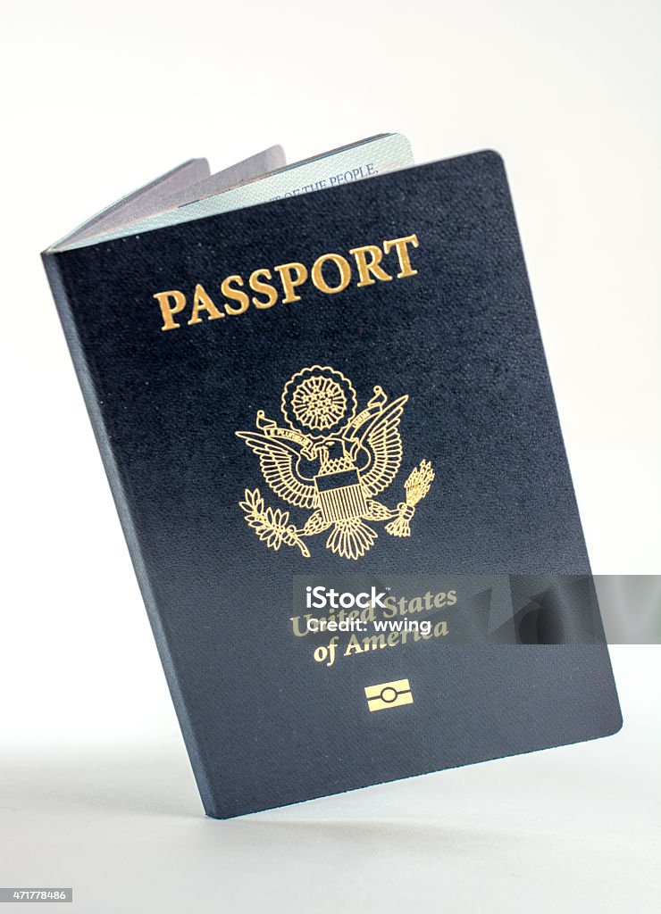 United States passport open, slanted, and on light background Passport Stock Photo