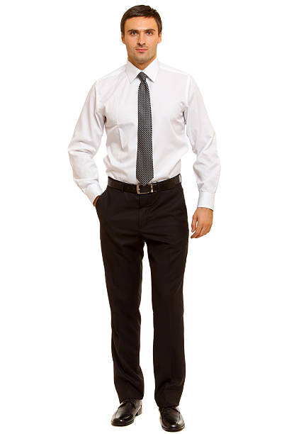istock Well-dressed man. Charismatic businessman standing on white background 471778494