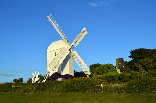 Jack & Jill windmills, Jill being the white fully restored working corn mill and Jack as of August 2013 in the process of being restored. Jill was built in 1821 and Jack in 1866. They are on Clayton hill, West Sussex England.