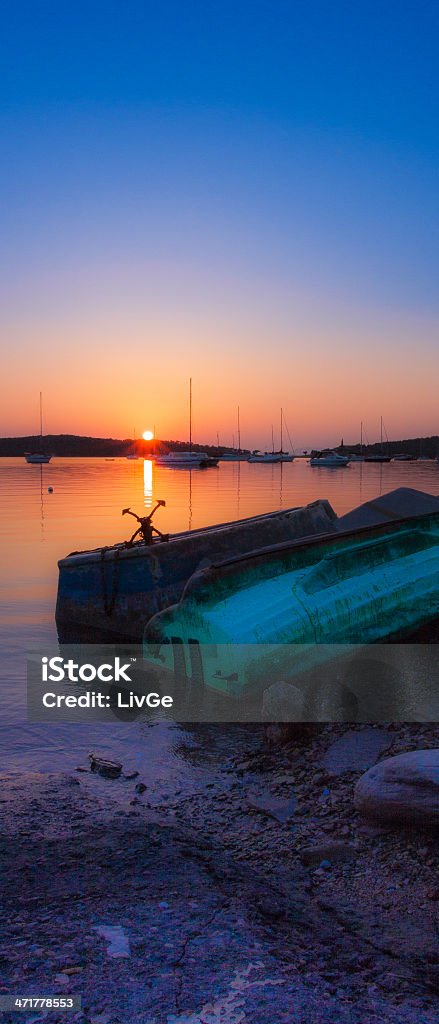 Perder barcos com o pôr-do-sol - Foto de stock de Azul royalty-free