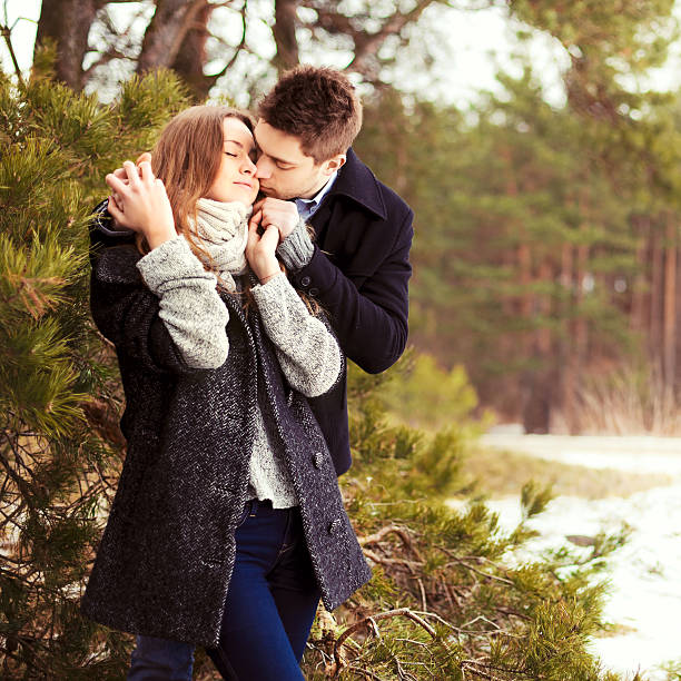 Young beautiful sensual couple outdoor portrait stock photo