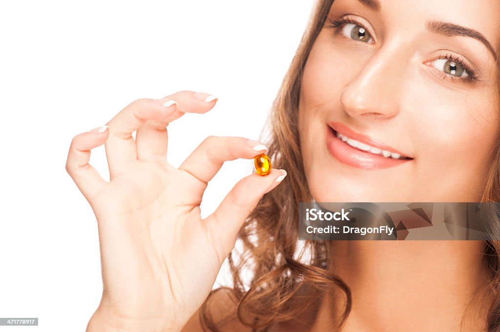 Donna con Pillola - Foto stock royalty-free di 20-24 anni