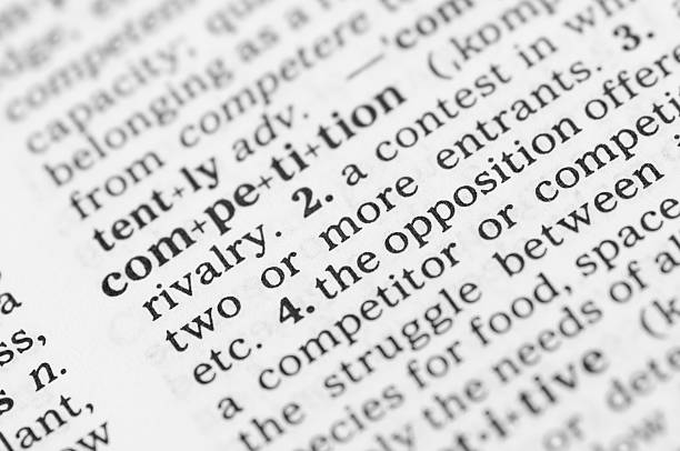istock Macro image dictionary definition of competition 471778935