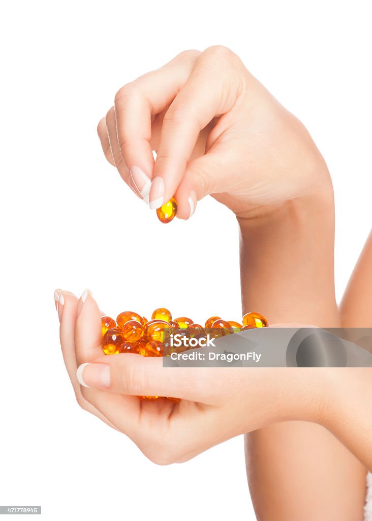 Mujer manos con pillls - Foto de stock de Adulto libre de derechos