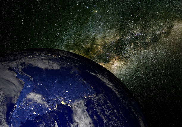 istock Earth from space at night with Milky Way. South America. 471779533