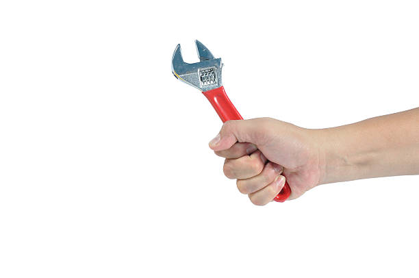 istock Man hand holding manual wrench isolate on white background, clip 471781490