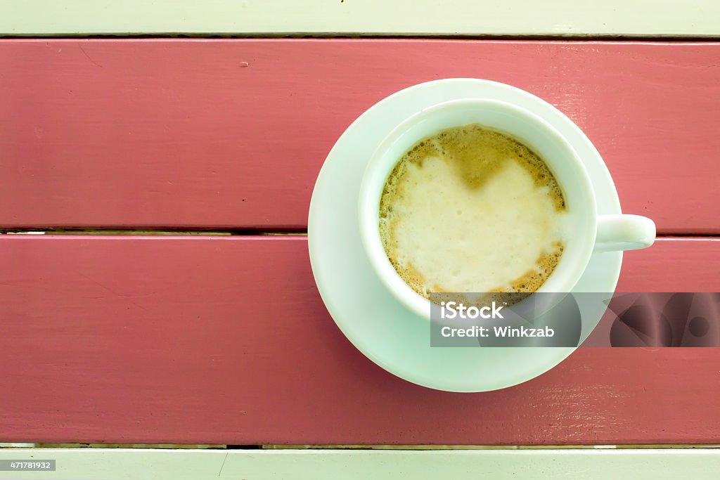 cup of coffee on wooden table, top view 2015 Stock Photo