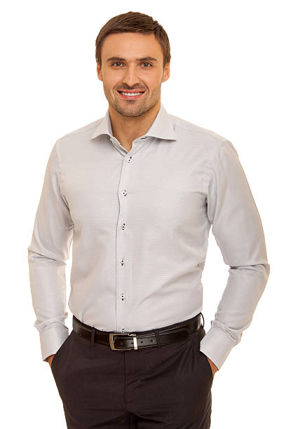 istock Well-dressed man. Charismatic businessman standing on white background 471783922