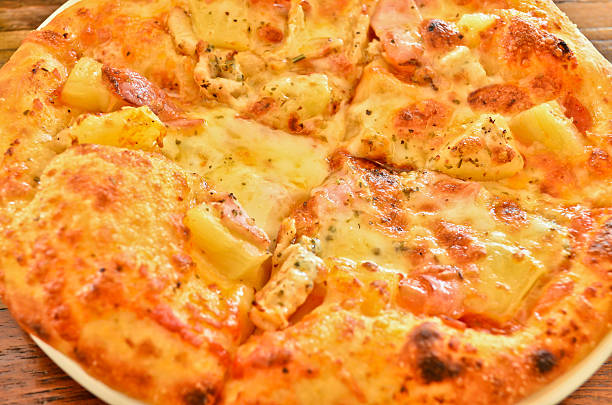 istock delicious hawaiian rustic style pizza made with fresh pineapples 471784265