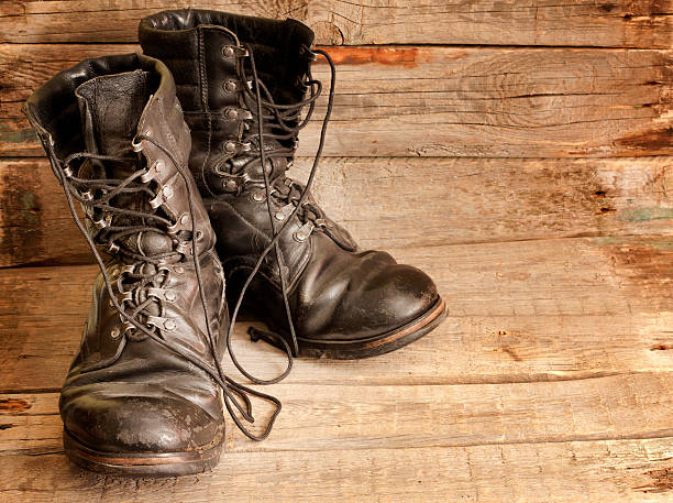 istock Old shoes on vintage planks 471784431