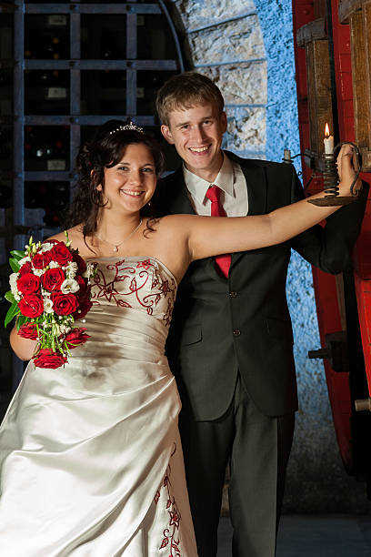 istock Bridal couple in a wine cellar 471784583