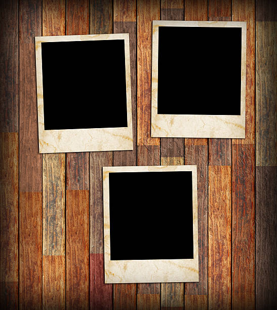istock Grunge vintage photo frames on a wood 471785825