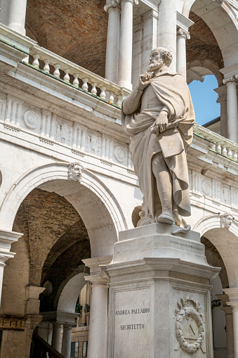 Statue of Palladio in Front of The  Basilica Palladiana, a Renaissance building in the central Piazza dei Signori in Vicenza, north-eastern Italy, designed by the famous architect. The statue was completed by the Italian sculptor Vicenza Gajassi in 1859.