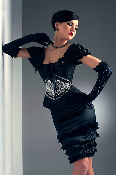 istock Girl in black evening beaded dress 471786147