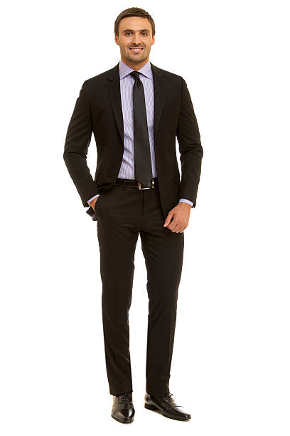 istock Well-dressed man. Charismatic businessman standing on white background 471786826