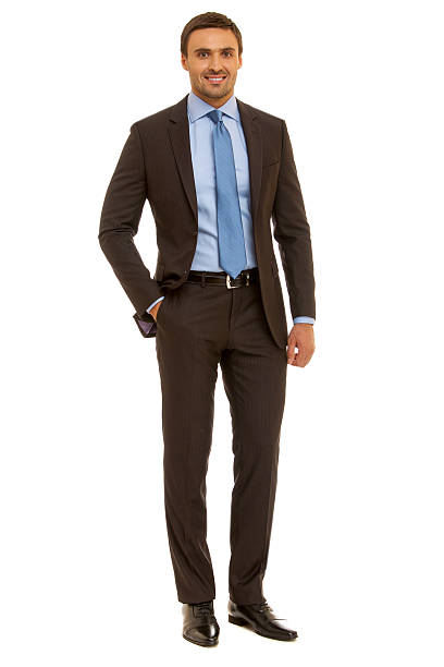 istock Well-dressed man. Charismatic businessman standing on white background 471786846