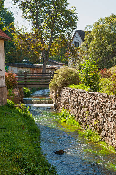 istock Narrow canal in old town Kuldiga, Latvia 471786848