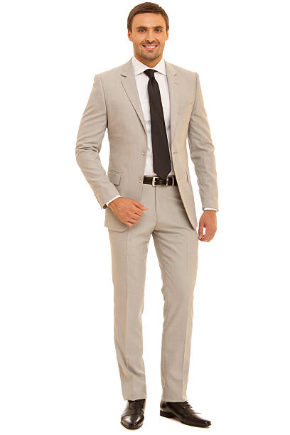 istock Well-dressed man. Charismatic businessman standing on white background 471786870