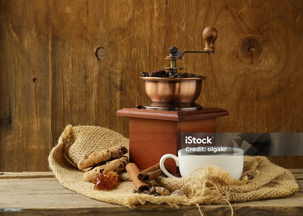 Still life of wooden coffee grinder, sugar, biscuits Backgrounds Stock Photo