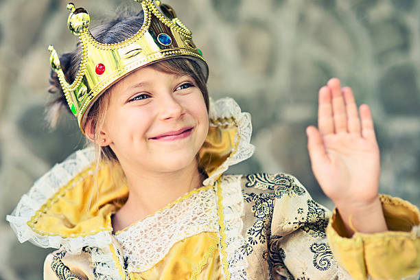 istock Little princess waving 471788165