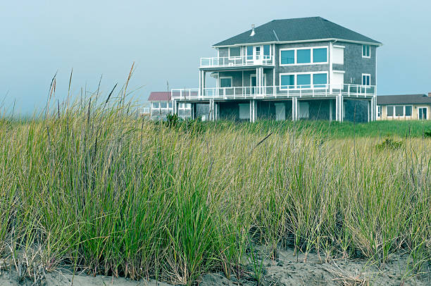 Houses on embankment above beach near Pacific Ocean in Washington state